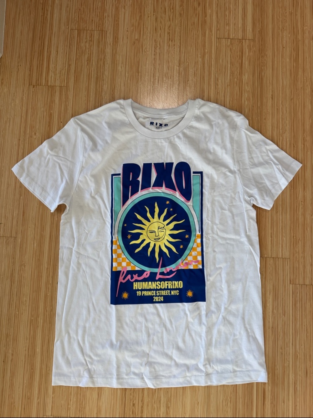 RIXO White Tee with Multicolor Sun Graphic